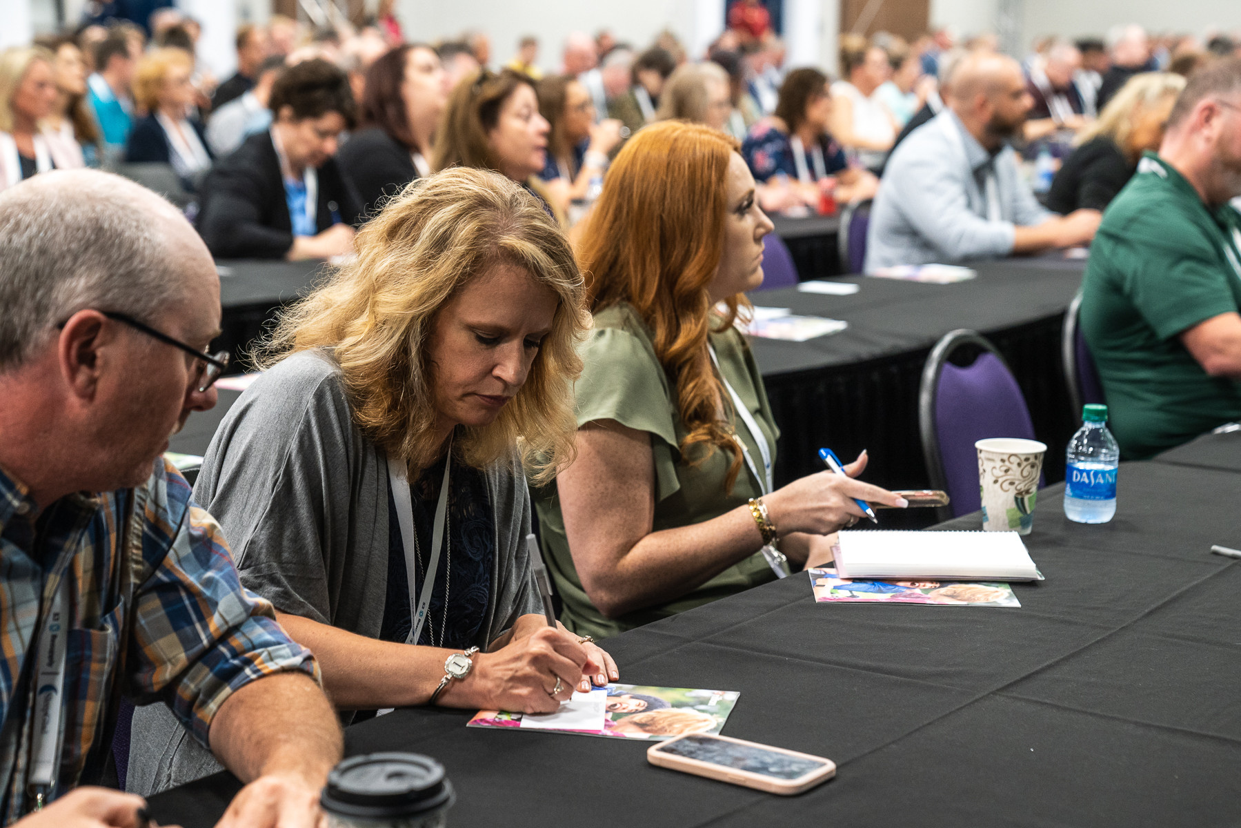 Room full of Heartland conference attendees watching a presentation